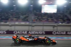 世界杯平台-F1卡塔尔站首练：迈凯伦一(yī)二名领跑，皮亚斯特里霸气夺最(zuì)速圈